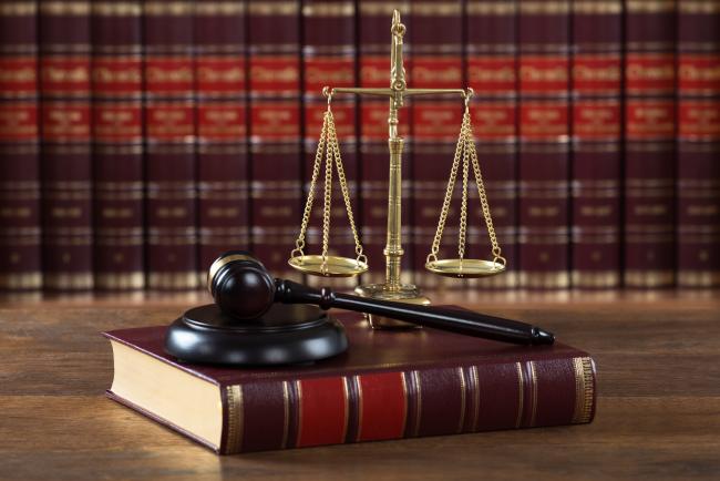 Stock photo of books, scales, and gavel