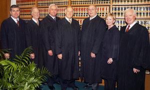 Seven appellate justices posing together